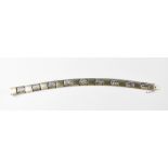 LARISSA; a modern 14ct (585) two-tone white gold reticulated bracelet,