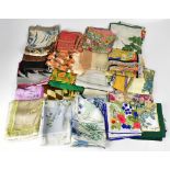 A large collection of vintage and early 20th century silk, cotton voile and crepe scarves,