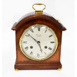 FRANZ HERMLE; a Comitti of London mahogany cased chiming mantel clock,