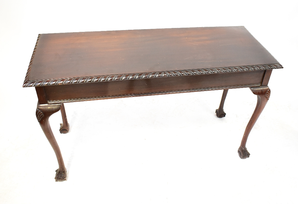 A 19th century mahogany side table, the rectangular top with gadrooned borders,