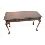 A 19th century mahogany side table, the rectangular top with gadrooned borders,