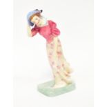 ROYAL DOULTON; a porcelain figure 'Windflower',