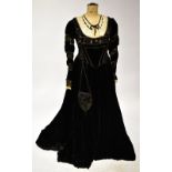 A mid-1800s Victorian black velvet mourning gown,