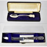 A Sheffield silver grapefruit knife with stainless steel blade and filled silver handle,