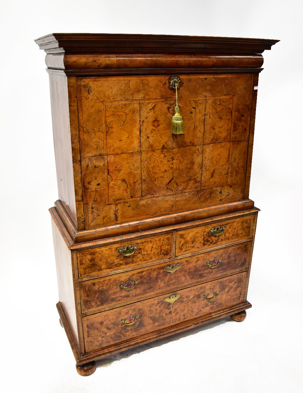 A late 17th/early 18th century burr walnut escritoire with fall-front revealing a fitted interior