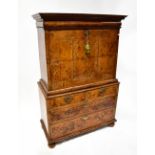 A late 17th/early 18th century burr walnut escritoire with fall-front revealing a fitted interior