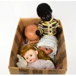 Four c1960s dolls to include two Pedigree examples, a baby girl doll and a baby boy Caribbean doll,