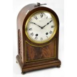 MAPLE & CO; a mahogany dome case mantel clock,