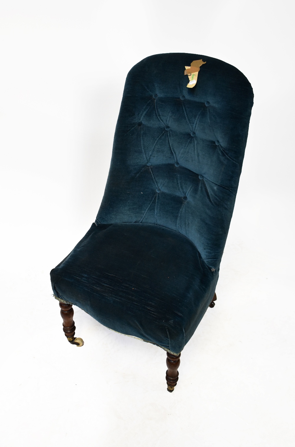 A Victorian mahogany button back parlour chair upholstered in blue velour,