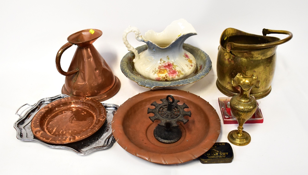 Various items of copper and brassware to include a brass helmet-shaped coal scuttle,