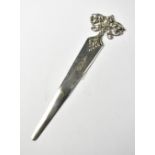 A Victorian hallmarked silver letter opener, the handle in the form of a pierced foliate scroll,