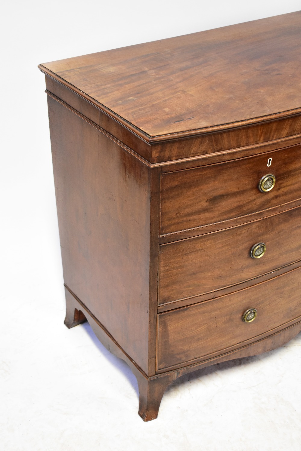 A 19th century mahogany bow-fronted chest of two short over two long drawers, - Bild 2 aus 3