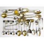 A quantity of hallmarked silver spoons of varying ages and designs,