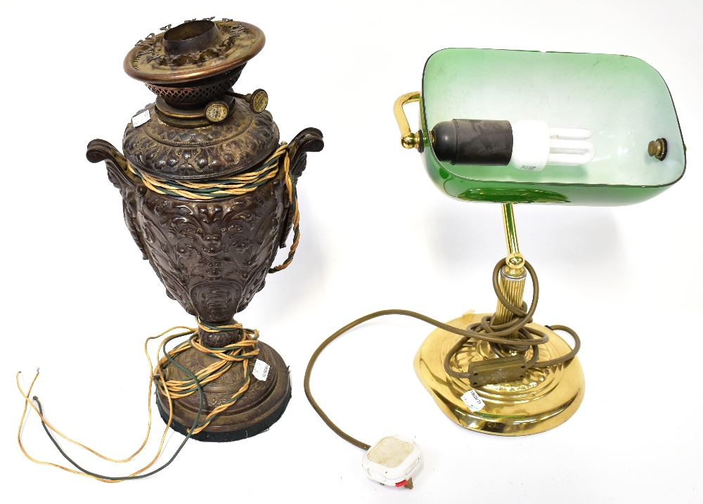 An early 20th century metal Wright and Butler of Birmingham Premier Duplex oil lamp in the