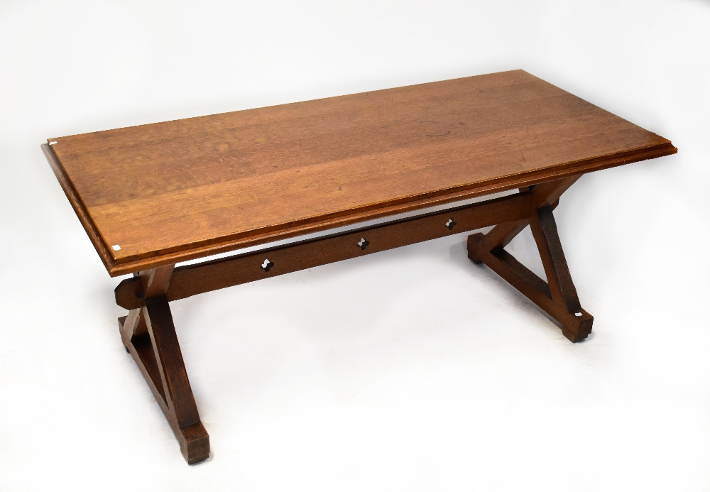 An early 20th century oak Refectory table with X-framed stretchered supports, 81 x 191 x 89cm.