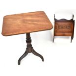 An early 19th century mahogany tripod table with tilt top and catch,