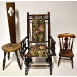 A children's Victorian-style rocking chair with upholstered seat and back,