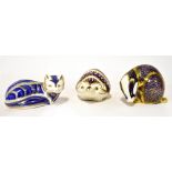 ROYAL CROWN DERBY; three Imari pattern porcelain paperweights comprising badger, fox and hedgehog,