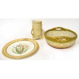 ROYAL WORCESTER; a blush ware twin-handled bowl, the exterior with basketweave-effect decoration,
