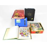 Seven stamp albums containing British and world stamps, to include a Standard album, blue album,
