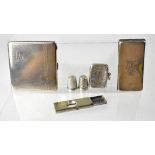 A Victorian hallmarked silver card case, London 1891, a hallmarked silver cigarette case,