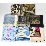 A collection of eight vintage silk scarves including a Valentino example of sky blue ground with