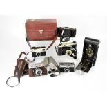 A collection of vintage cameras to include Audax field camera, an Eastman Kodak USA No.