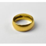 A 22ct gold band ring, size J, approx 4.2g.