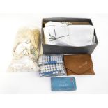 A group of over 100 vintage ex shop stock white lawn ladies' handkerchiefs,