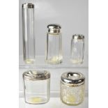 Four dressing table items to include a cut glass hat pin holder with hobnail design,