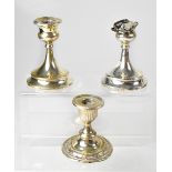A pair of hallmarked silver candlesticks, marks rubbed (both af), height 11.