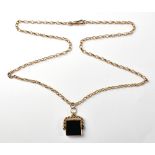 A late 19th century 9ct rose gold belcher necklace, with square seal within gold swivel mount,
