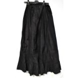 A black taffeta embroidered underskirt,