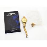 LONGINES; a ladies' yellow metal watch, the gilded dial set with baton numerals and date aperture,