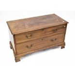 A 19th century mahogany low chest of two long drawers, with brass swan neck drop handles,