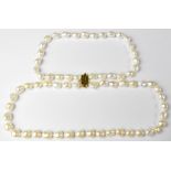 A double strand of fresh water Baroque pearls with an 18ct yellow gold stepped Art Deco style clasp.