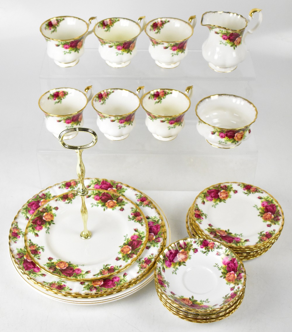 ROYAL ALBERT; a quantity of 'Old Country Roses' tea and dinner ware to include three large plates,