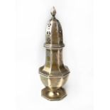 An Edwardian hallmarked silver sugar sifter of octagonal form, with pierced top and acorn finial,