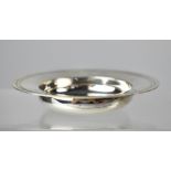 An Elizabeth II hallmarked silver Armada pin dish, William Comyns & Sons Ltd, London 1968,