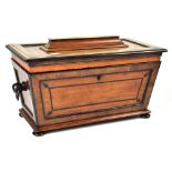 A good early 19th century mahogany rosewood cross banded and inlaid tea caddy of sarcophagus form,
