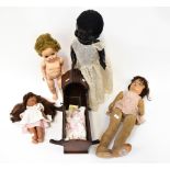 Four vintage dolls comprising a circa 1960s Pedigree Mama baby doll,