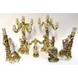 Two pairs of 19th century Continental porcelain candlesticks,