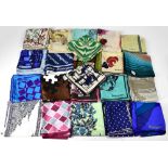 JACQMAR; twenty-two vintage silk scarves, various colour palettes and patterns to include floral,