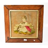 A 19th century tapestry picture depicting a little girl holding her dog on her knee, 34 x 33cm,