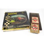 A vintage Tri-ang Scalextric GP3 Model set to include racing cars, track, instructions,