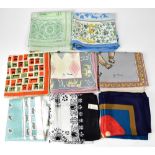 A collection of eight vintage silk scarves to include two Loewe examples,