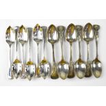 A set of George VI hallmarked silver grapefruit spoons, with Art Deco style terminals,