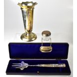 A collection of hallmarked silver items comprising a trumpet vase,