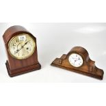 An early 20th century mahogany dome cased mantel clock, with brass key wind chiming movement,