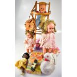 A group of vintage celluloid dolls, various sizes and makes, some in original clothing,